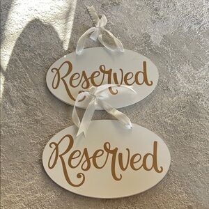 White and Gold Reserved Signs